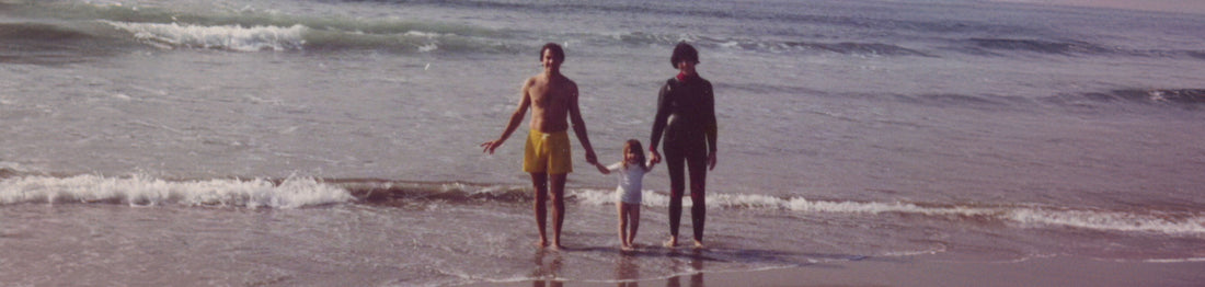 Danielle and her parents at the beach