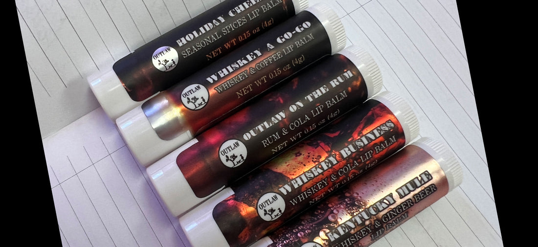 Outlaw whiskey and rum flavored lip balm