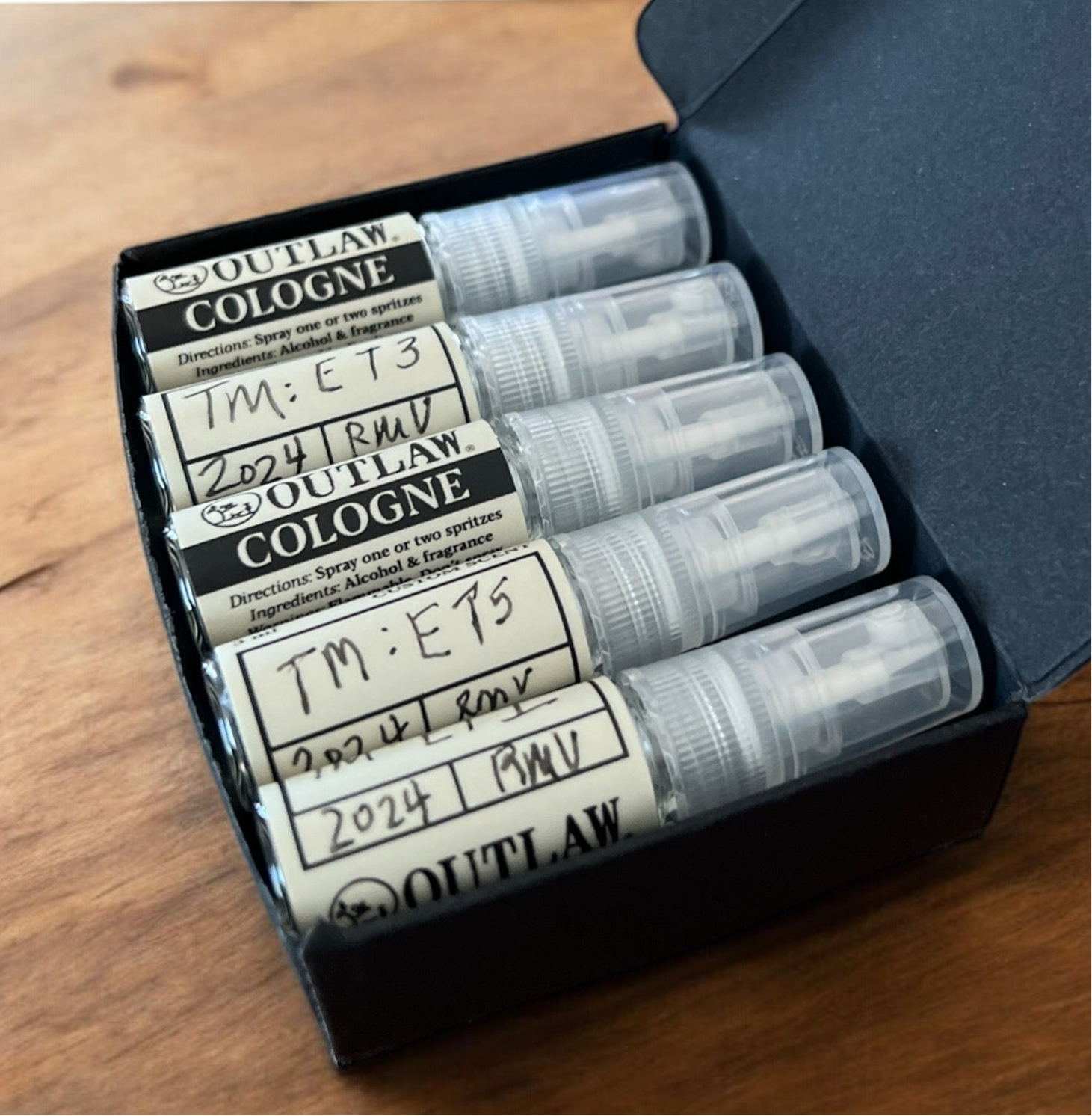 Custom Scent Flight - 5 Options Based on Your Direction: A boxed set of small cologne bottles, each representing a unique scent variation crafted from your ideas.