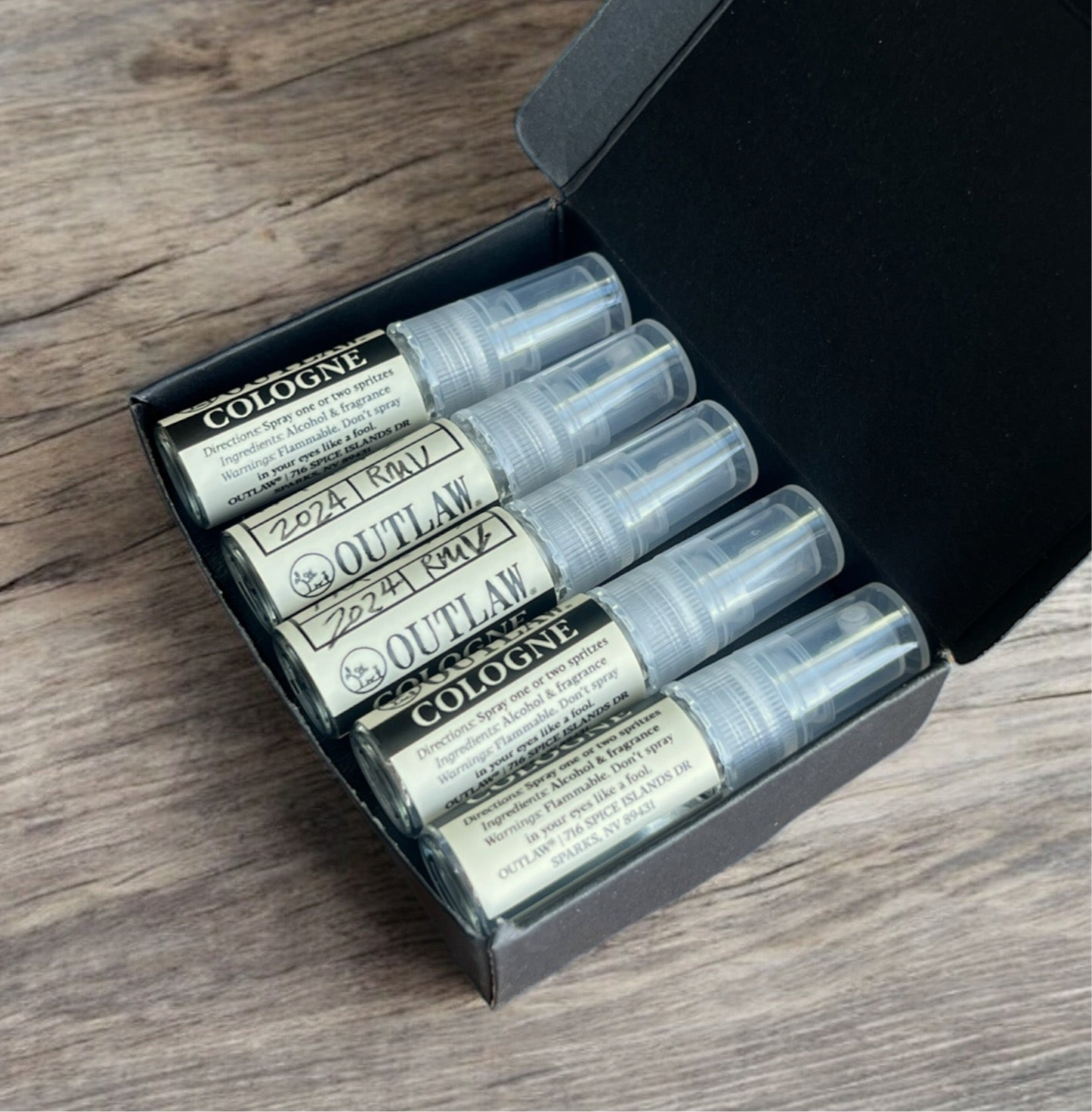 Custom Scent Flight - 5 Options Based on Your Direction: a set of cologne bottles with labels in a box, showcasing personalized scent variations.