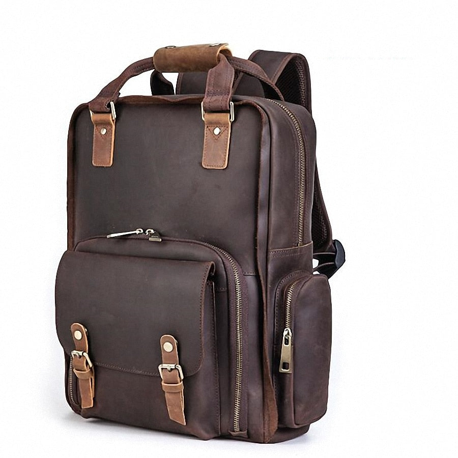 Gaetano Large Leather Backpack Camera Bag featuring a front pocket, zippers, leather straps, and a tripod holder. Ideal for photographers seeking adventure-ready gear.