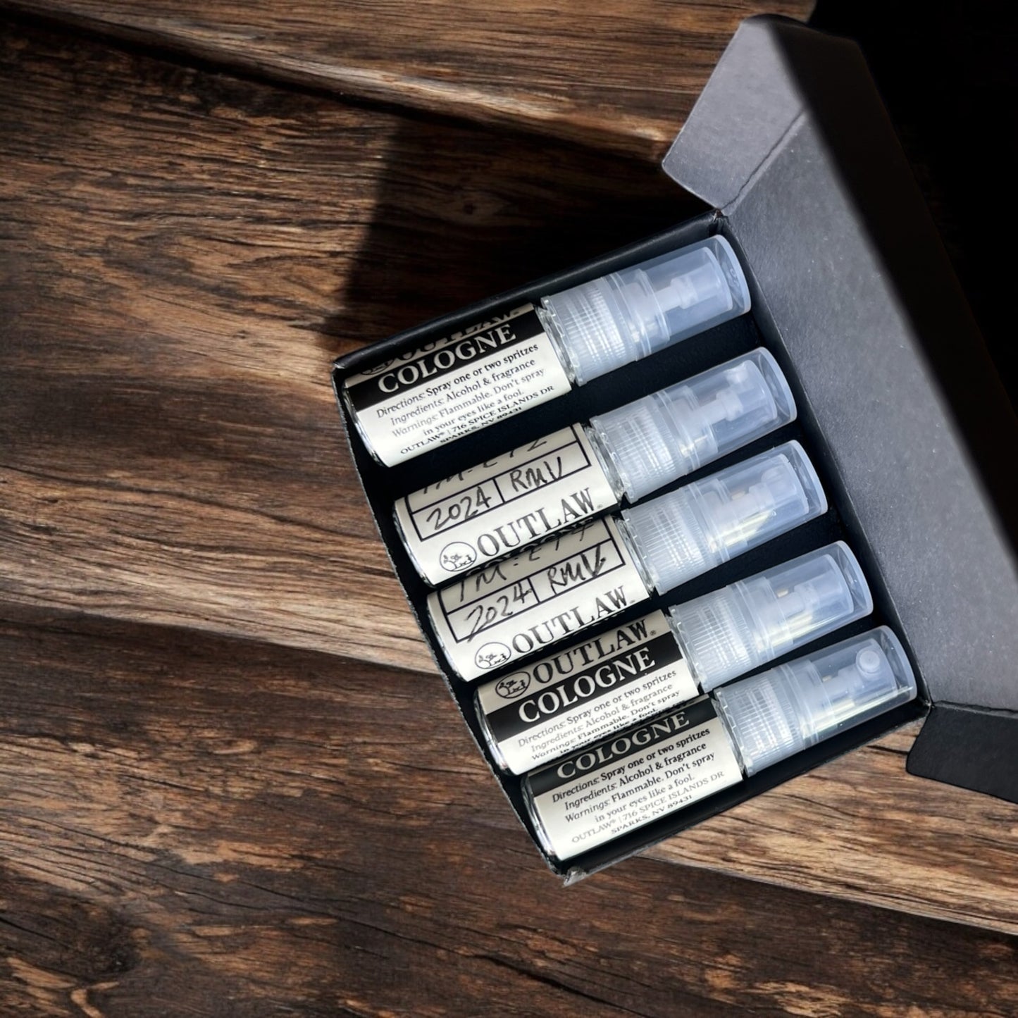 Custom Scent Flight - 5 Options Based on Your Direction: a set of bottles displayed in a box, showcasing diverse scent variations crafted for personalized fragrance exploration.