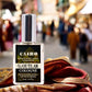 CAIRO Sample Cologne - November's Scent of the Month, 15 ml bottle, displayed on cloth, capturing a blend reminiscent of Cairo's smoky, mysterious nights.