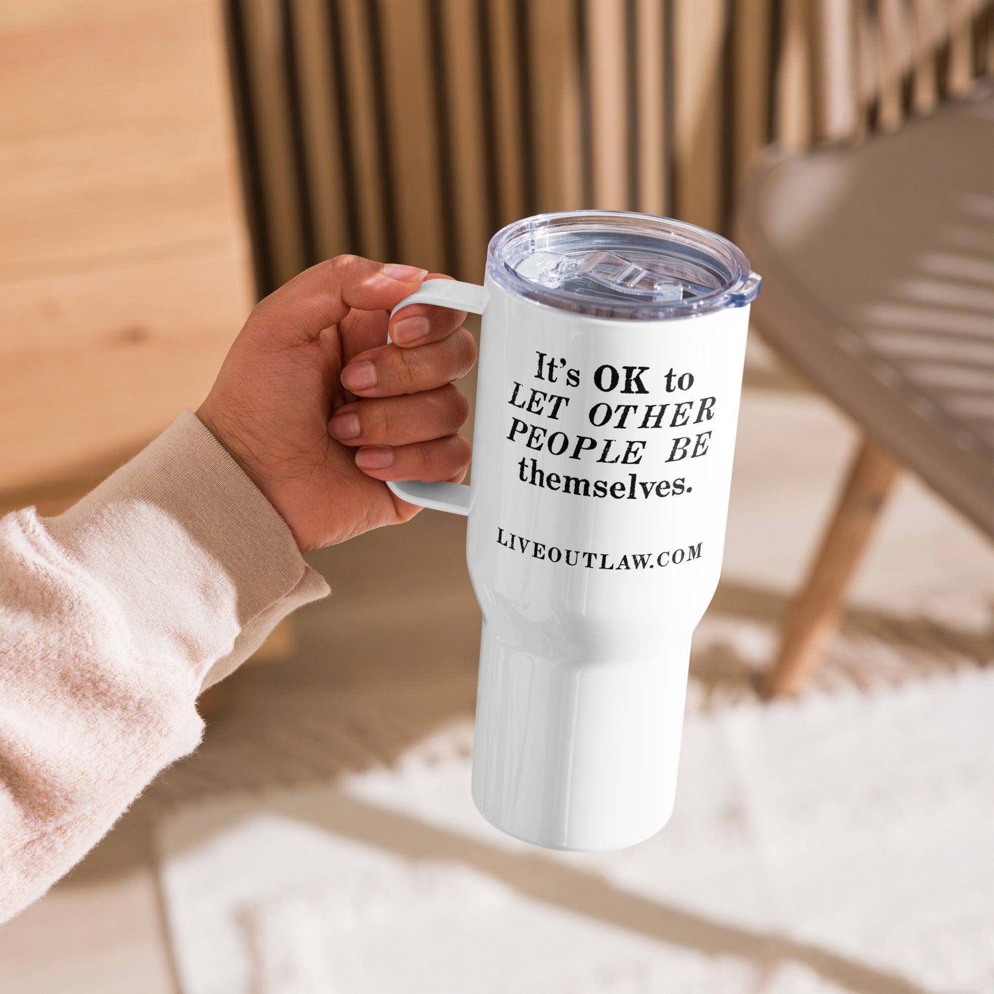 https://liveoutlaw.com/cdn/shop/files/travel-mug-with-a-handle-white-25-oz-right-6449b03d36c9f.jpg?v=1682550856&width=2000