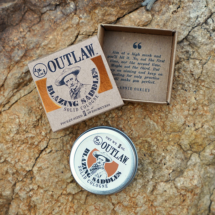 Blazing Saddles leather gunpowder sandalwood and sagebrush scented natural solid cologne by Outlaw