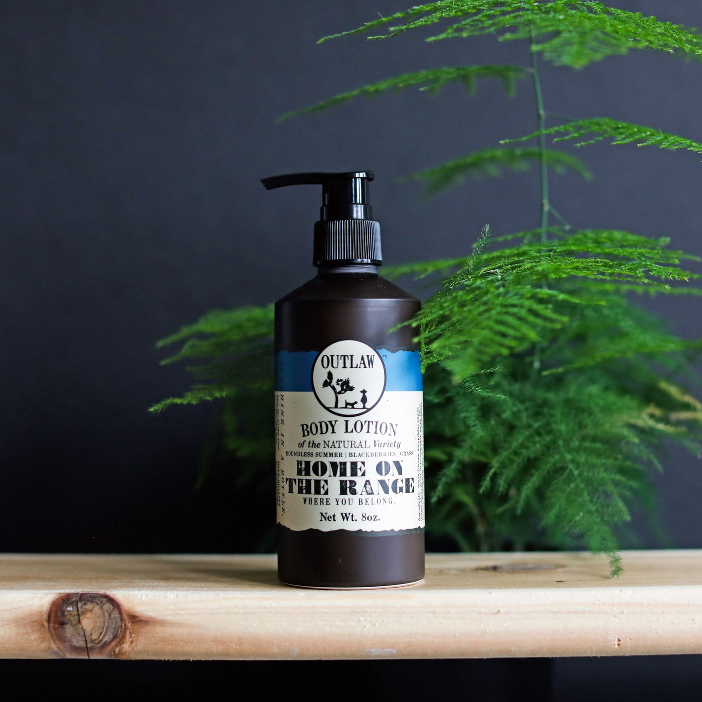 Natural body lotion with berry and grass scent by Outlaw