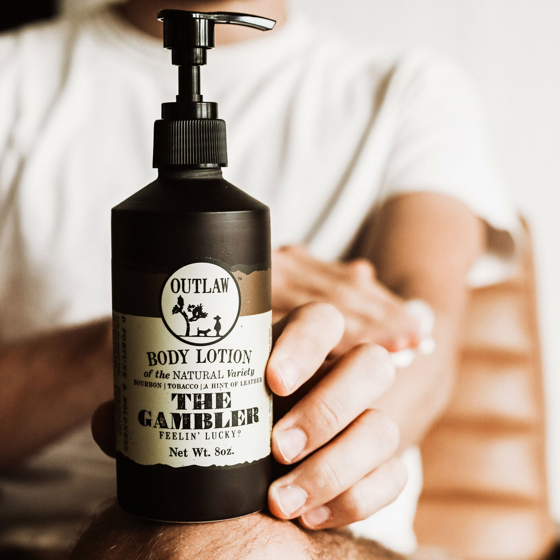 Natural body lotion with The Gambler leather and whiskey scent by Outlaw