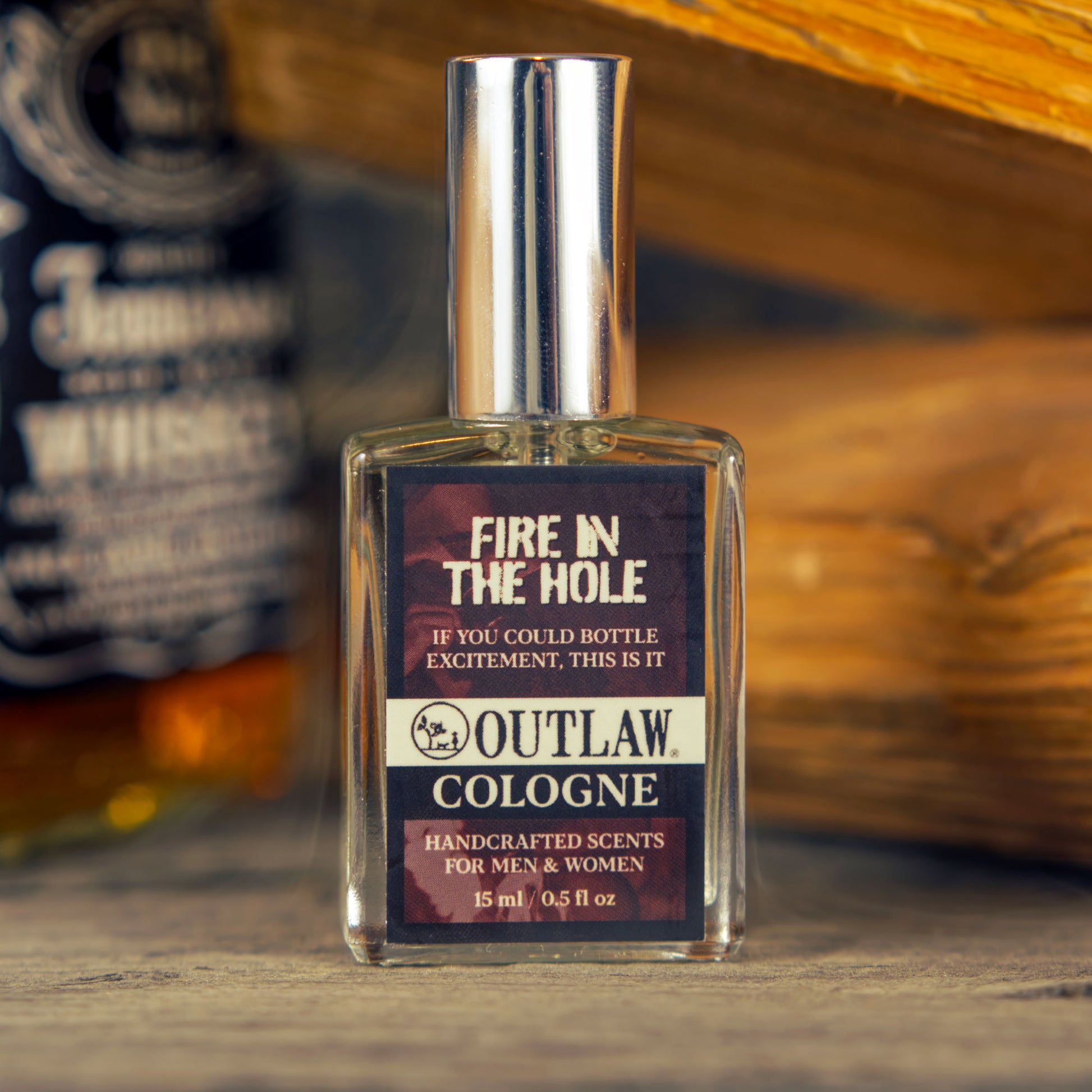 https://liveoutlaw.com/cdn/shop/products/fire-in-the-hole-campfire-whiskey-sample-cologne-for-men-and-women.jpg?v=1678238490&width=1946